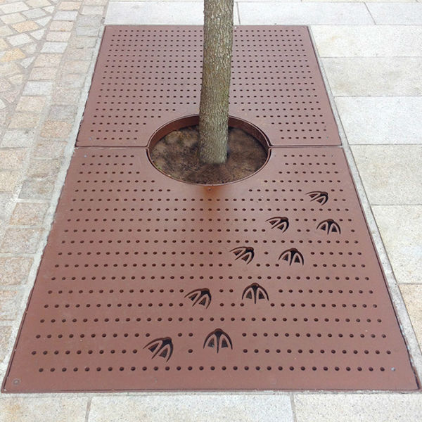 bespoke corten tree grille with laser cut geese feet