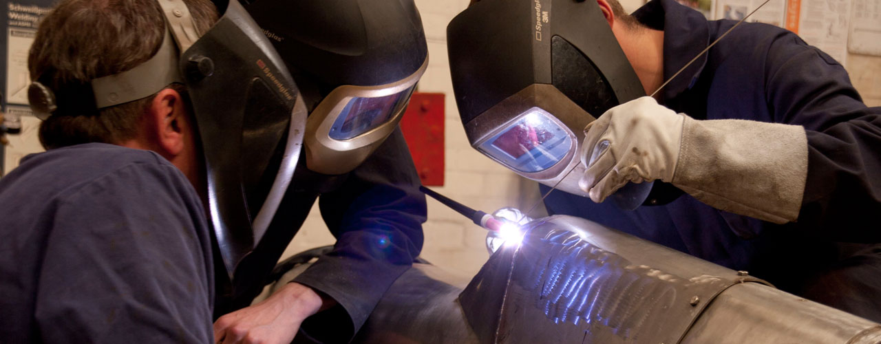 WEC Apprentices welding spitfire memorial sculpture