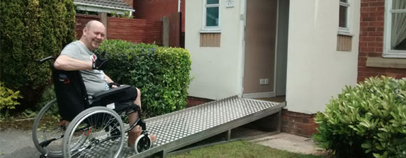 War Veteran using new stainless steel ramp